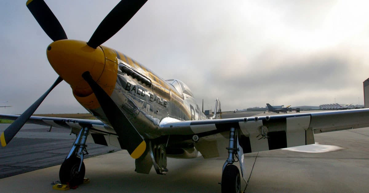 P-51-A P-51 Mustang displaying World War II D-Day markings is parked at the Atlantic City Air National Guard Base