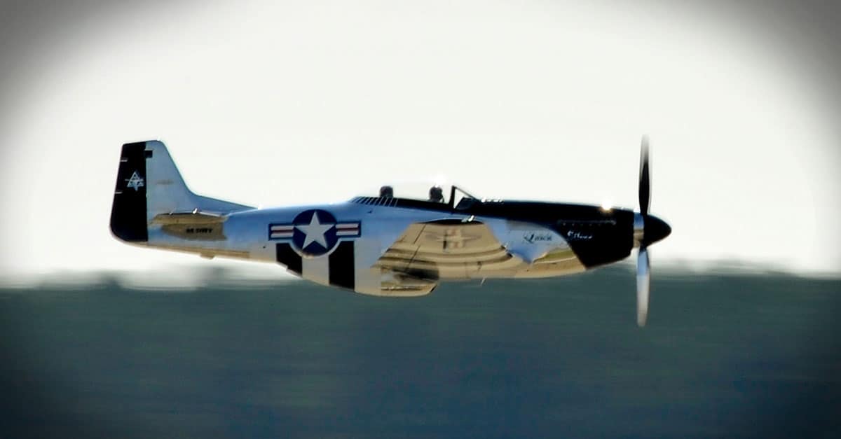 P-51- A P-51 Mustang passes over the Shaw flightline