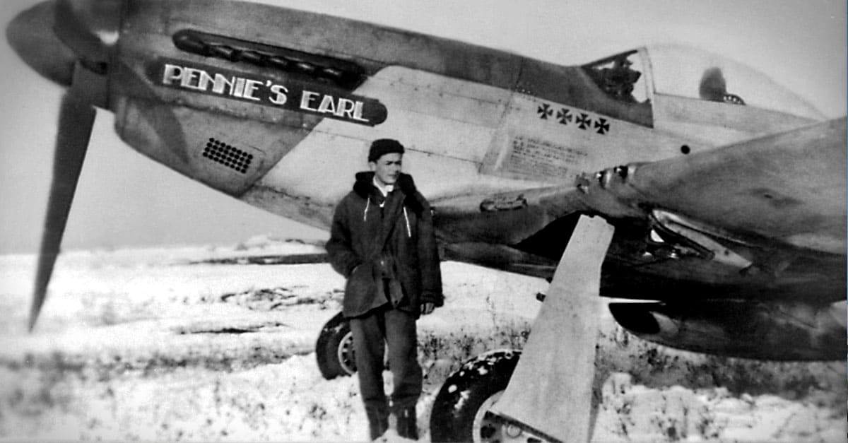 -51-Captain Lazear stands by the nose of his P-51D Pennie's Earl