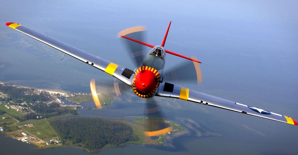 P-51-Ed Shipley flies a P-51 Mustang in a heritage flight during an air show at Langley Air Force Base