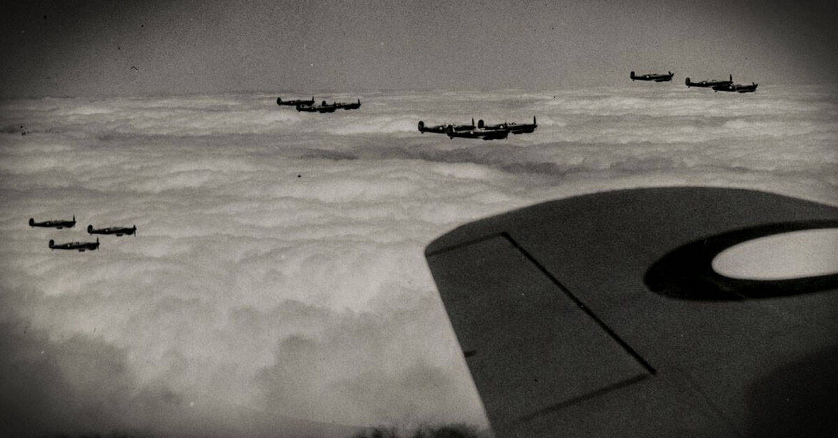 Supermarine Spitfire- Spitfire kings flying high above the clouds alongside a Royal Australian Air
